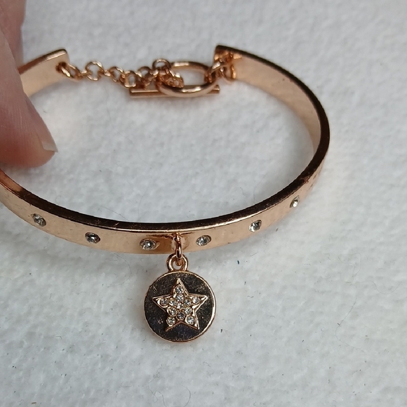 BCBGeneration Rose Gold Bangle Bracelet with Crystal Star Charm - Picture 2 of 5